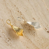 Leaf necklace styled as botanical jewelry