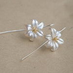 Lily drop earrings with delicate flower design