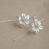 Lily drop earrings with delicate flower design