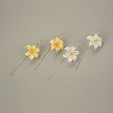Lily flower drop earrings showing handmade details