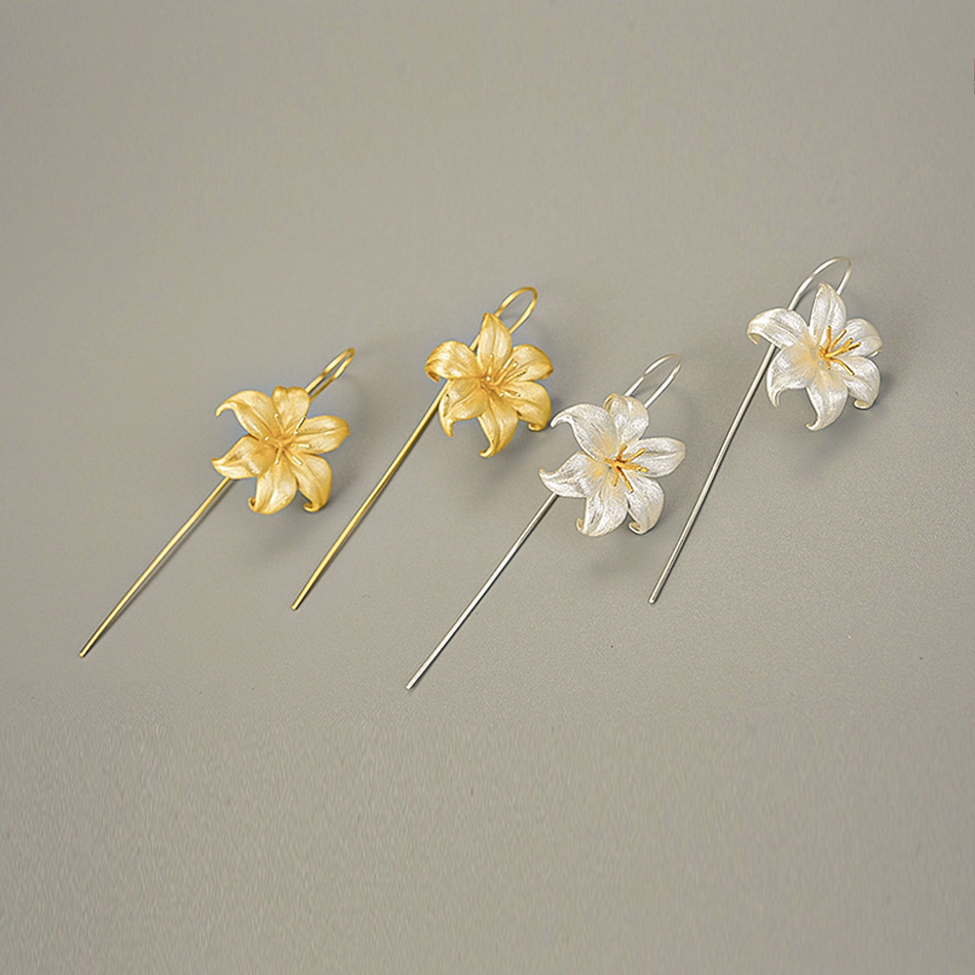 Lily flower drop earrings showing handmade details