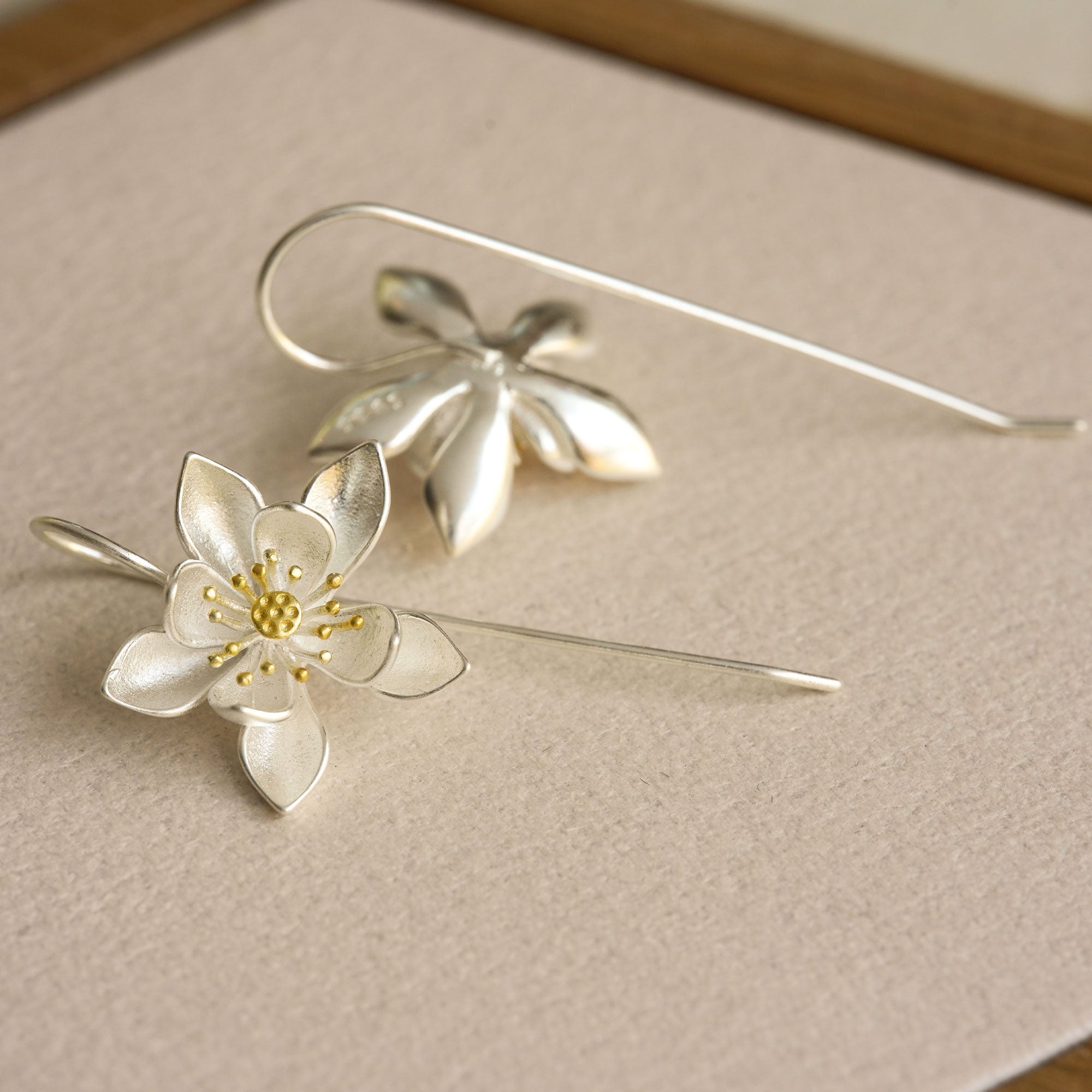 Lotus earrings with summer flower design