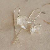 Magnolia flower earrings styled as boho jewelry