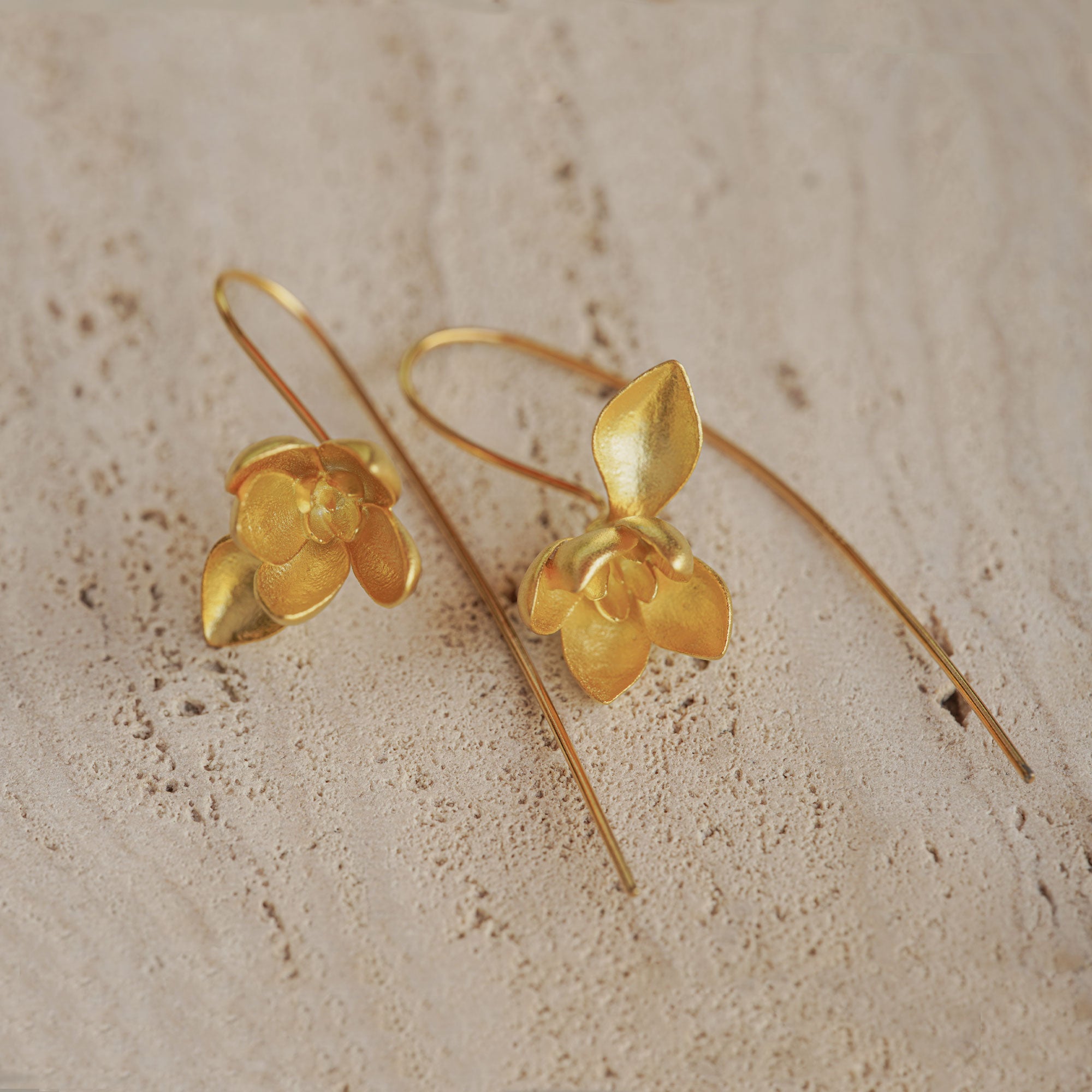 Magnolia flower earrings showing floral petal details