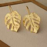 Monstera leaf earrings with tropical leaf design