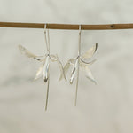 Orchid earrings showing handmade jewelry details