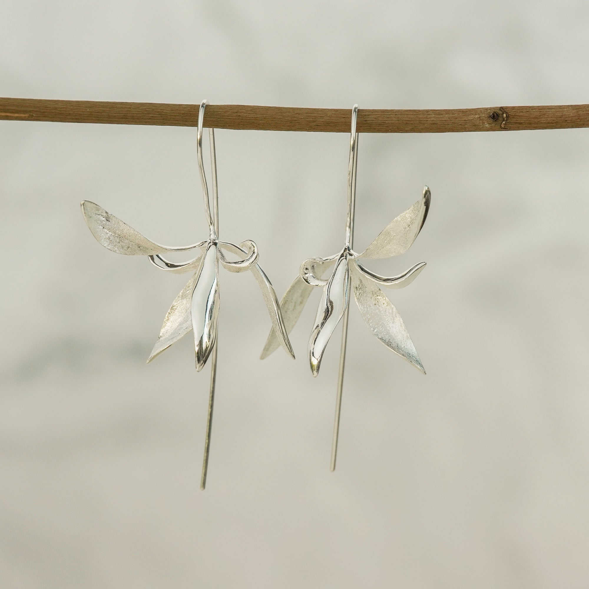 Orchid earrings showing handmade jewelry details