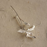 Orchid flower brooch styled for clothing or scarf