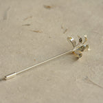 Osmanthus brooch styled for cardigan or scarf