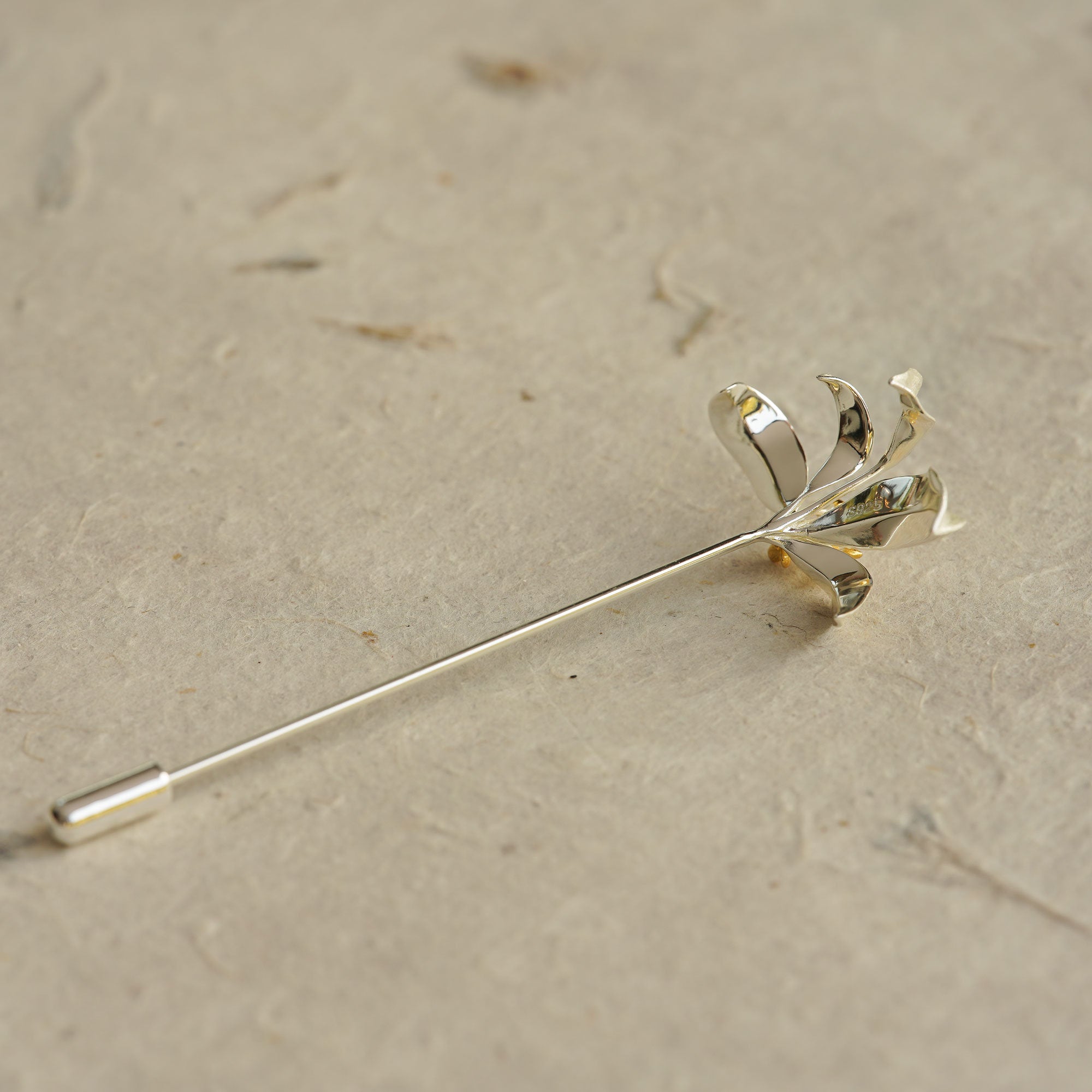 Osmanthus brooch styled for cardigan or scarf