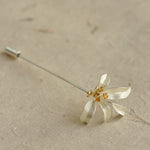Osmanthus brooch showing handmade floral details