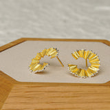 Pencil earrings styled as jewelry for artists