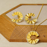 Pencil earrings showing handmade jewelry details