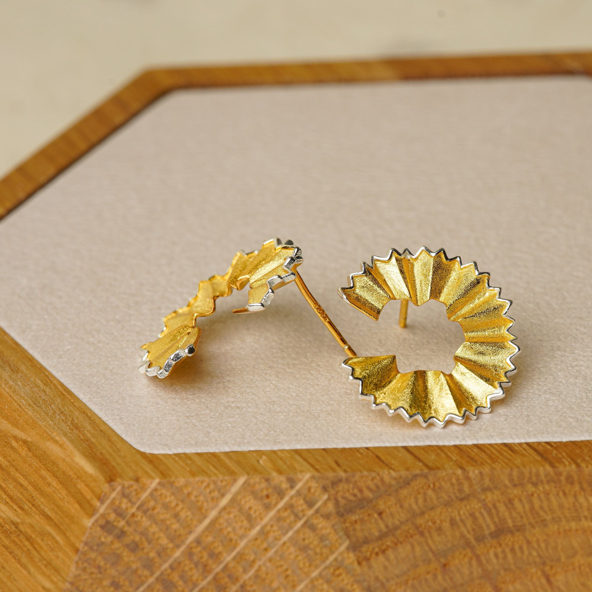 Pencil earrings displayed as a pair