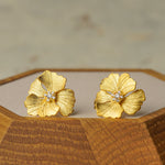 Peony earrings displayed as a pair