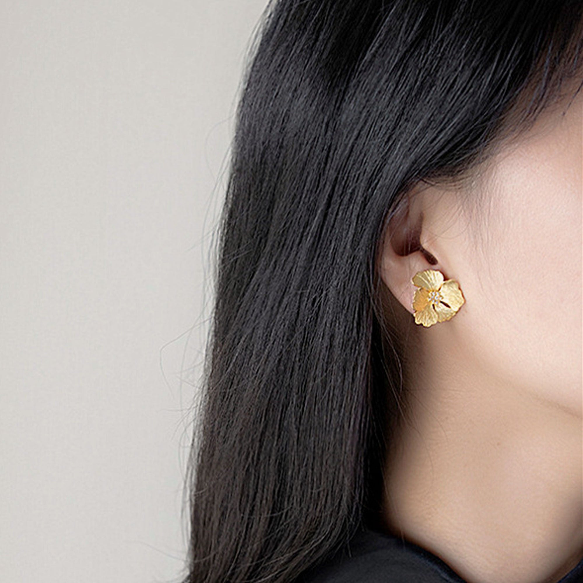 Side view of peony floral earrings