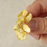Peony flower earrings showing handmade details