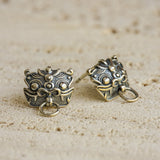 Pixiu earrings displayed as a pair