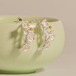 Plum blossom flower earrings with delicate floral design