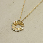 Side view of art pencil necklace pendant