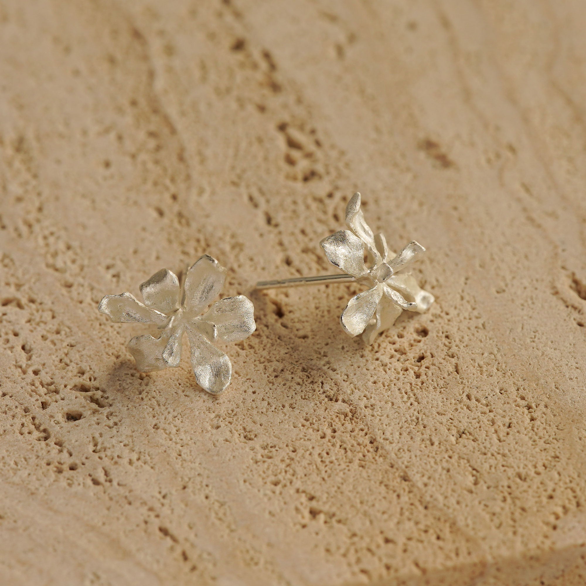 Side view of iris earring studs