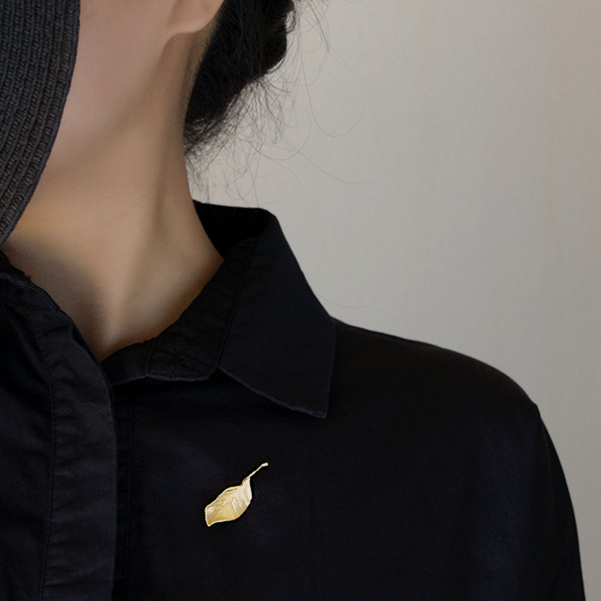Side view of leaf brooch