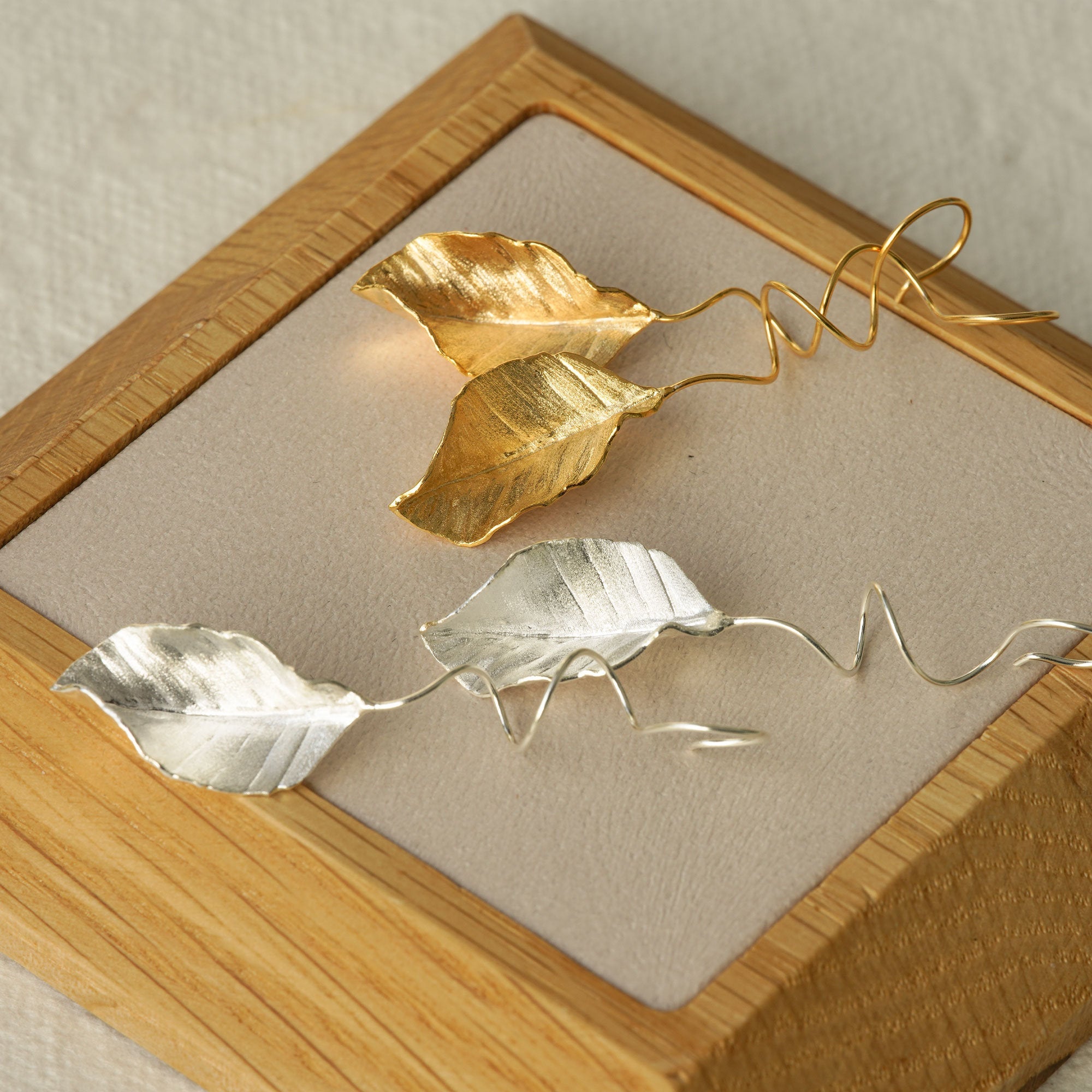 Side view of leaf dangle earrings