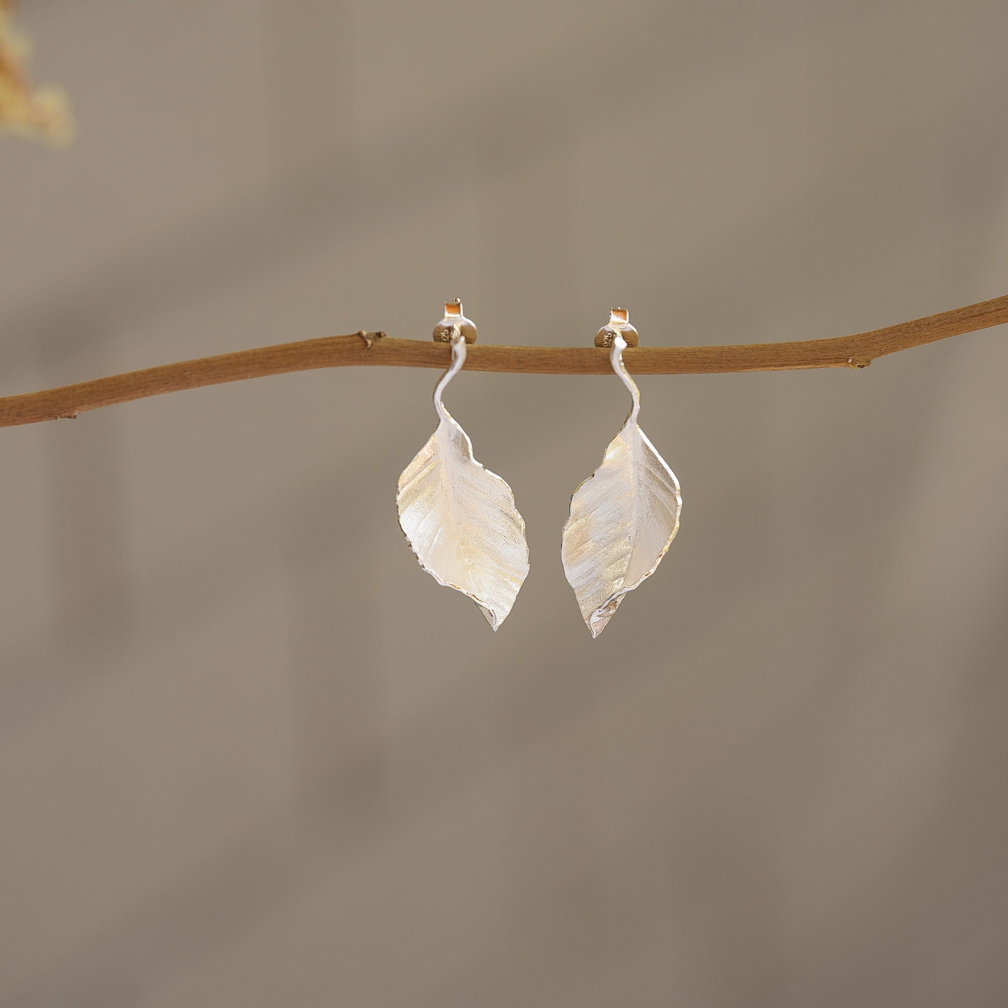 Side view of leaf drop earrings
