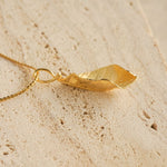 Side view of leaf necklace pendant