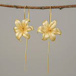 Side view of lily drop earrings