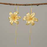 Side view of lily drop earrings