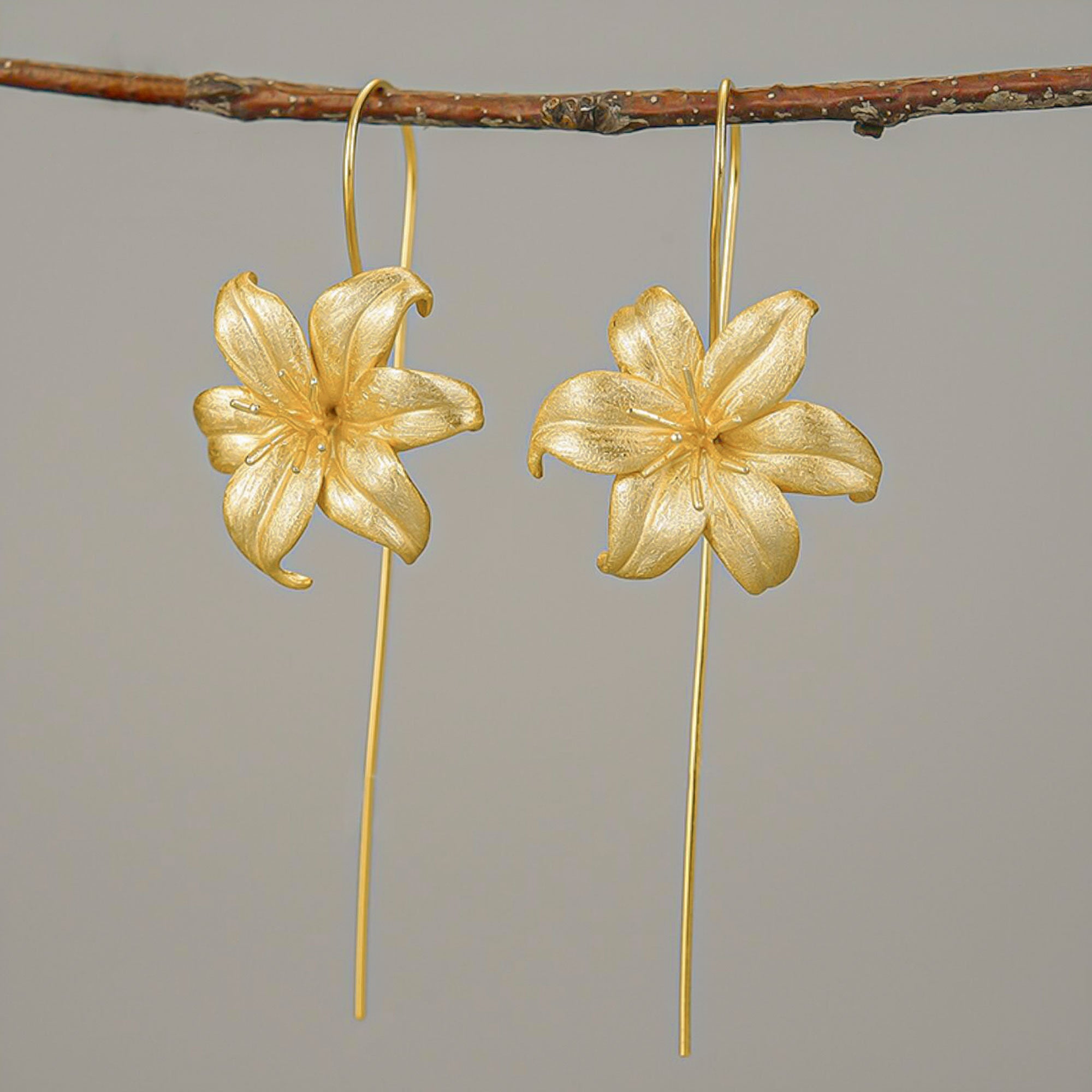 Side view of lily drop earrings