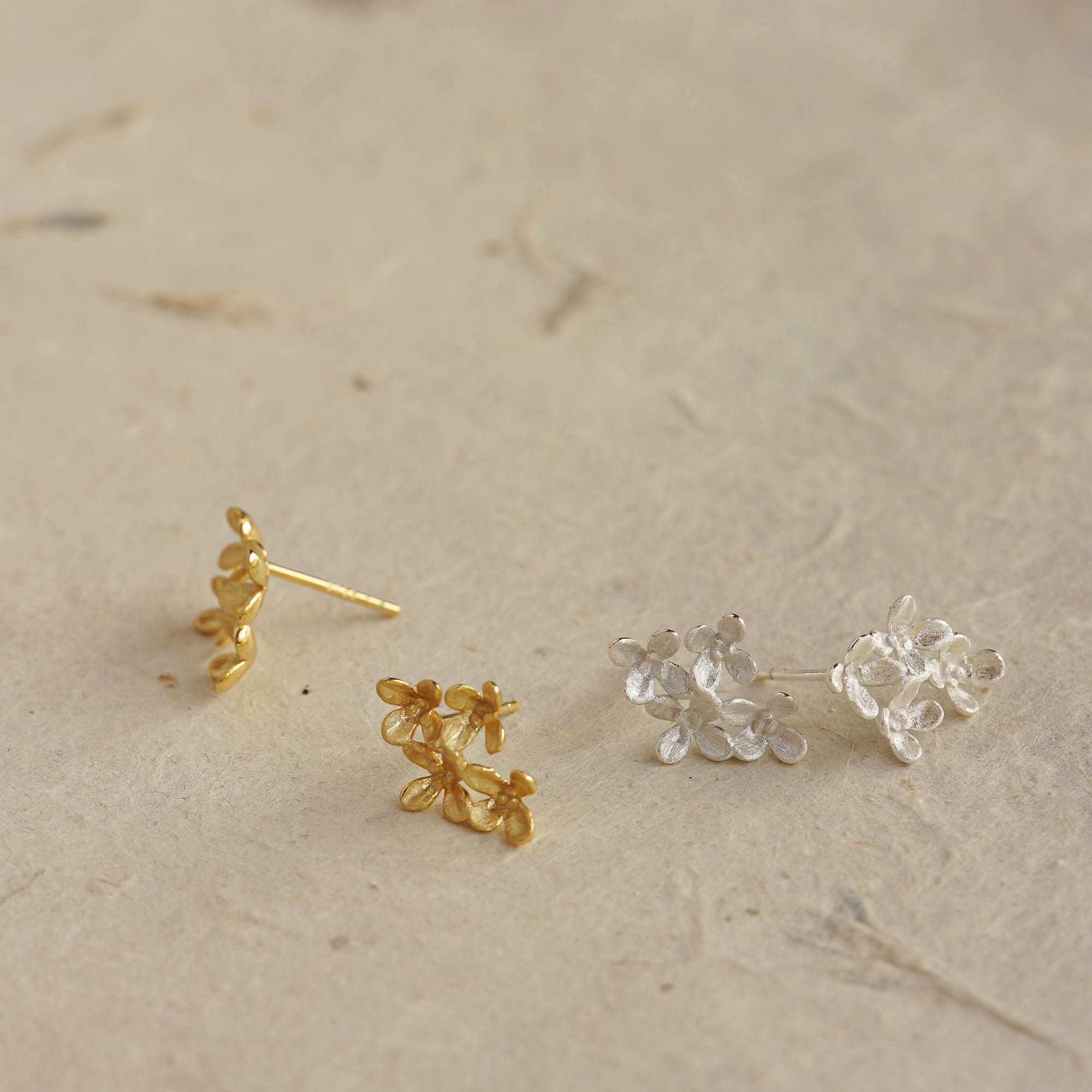 Side view of osmanthus flower earrings