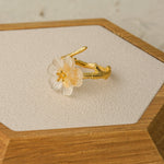 Side view of pear blossom ring