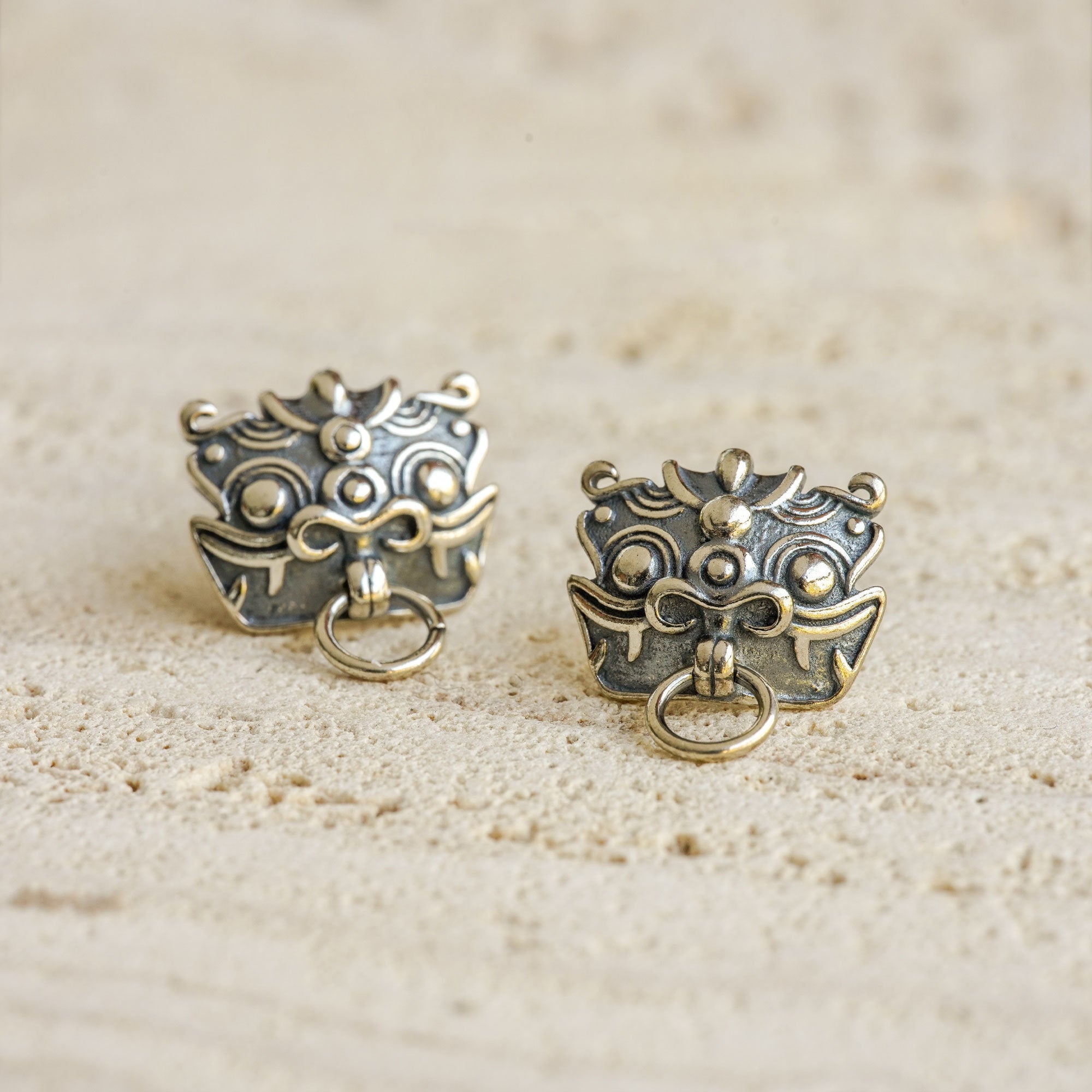 Side view of pixiu earrings