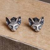 Sphinx cat earrings showing handmade jewelry details