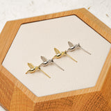 Tiny hummingbird earrings styled as bird jewelry