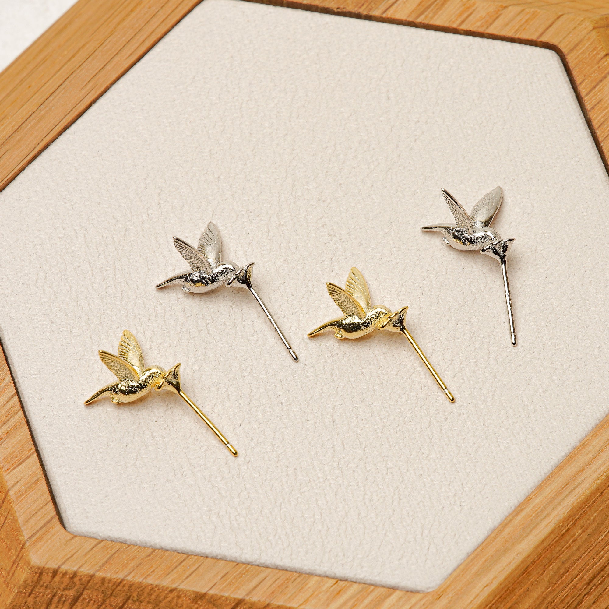 Tiny hummingbird earrings product detail view